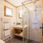 Our trio of matching chalets, Foehn, Covie & Charmilles all have smart ensuite shower rooms.