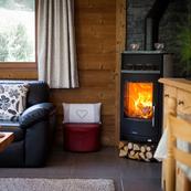 Cosy up to the wood burner at the end of the day.